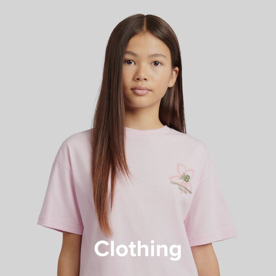 Girl in New Balance shirt