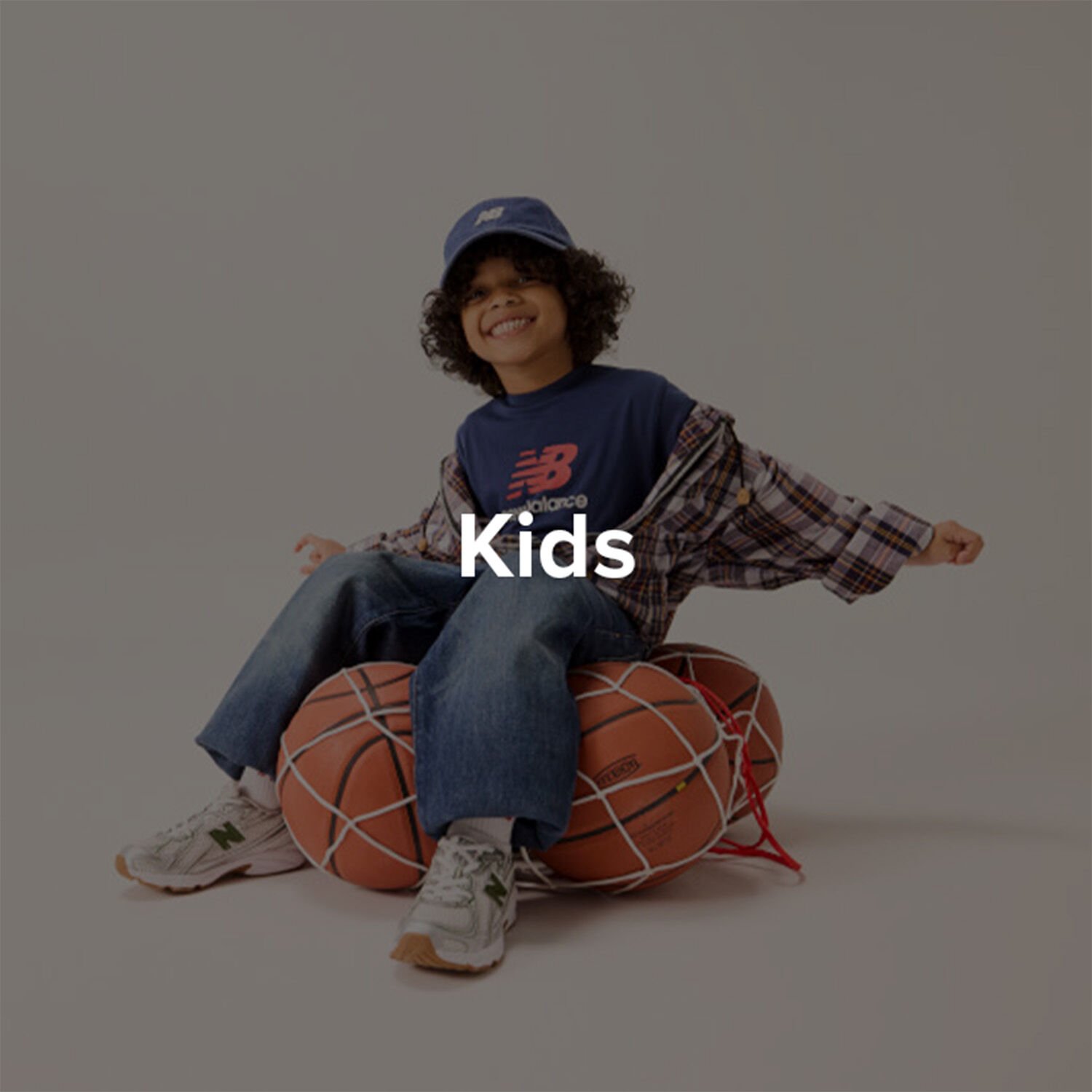 Boy in New Balance shoes.