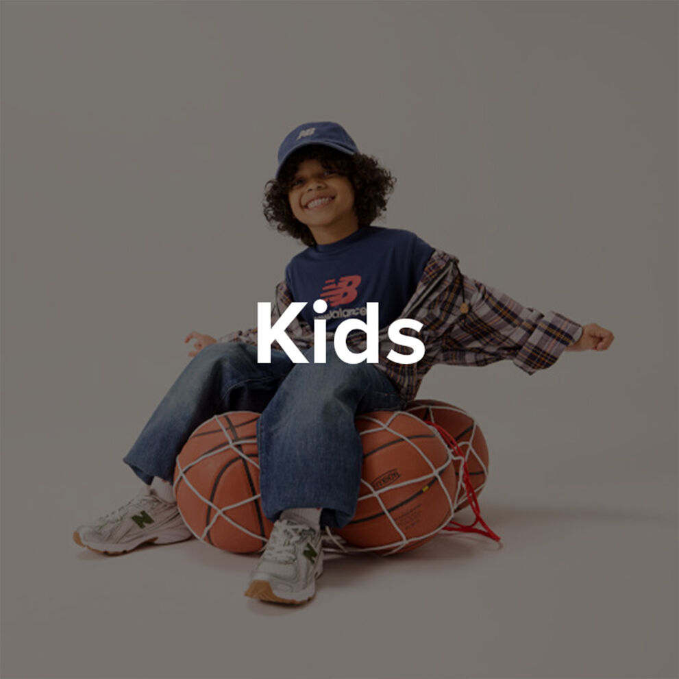 Boy in New Balance shoes.