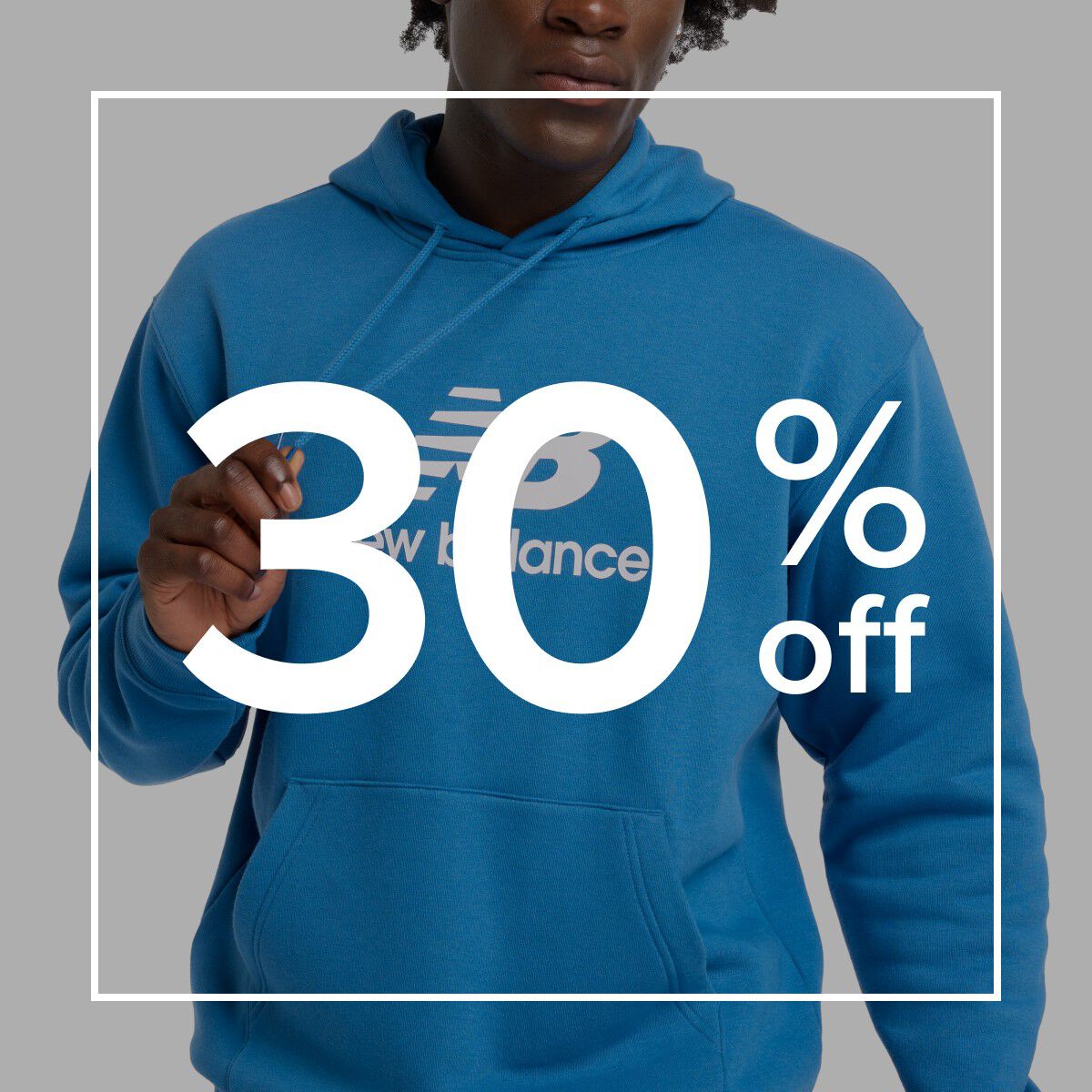 Man in New Balance sweatshirt.