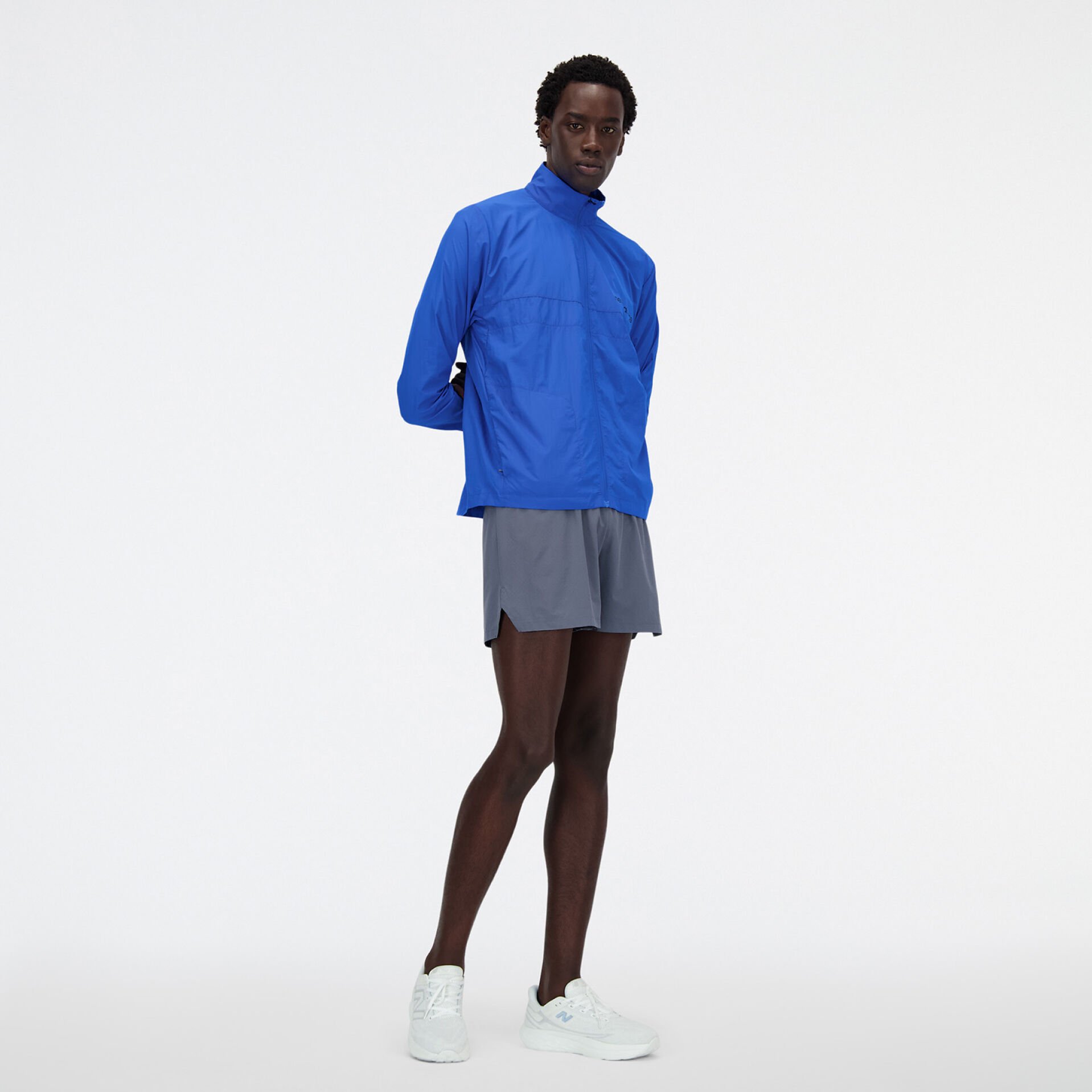 Man in blue New Balance jacket.