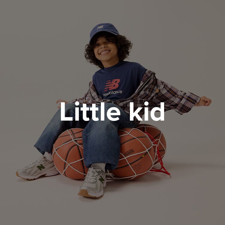 Boy in New Balance shoes.