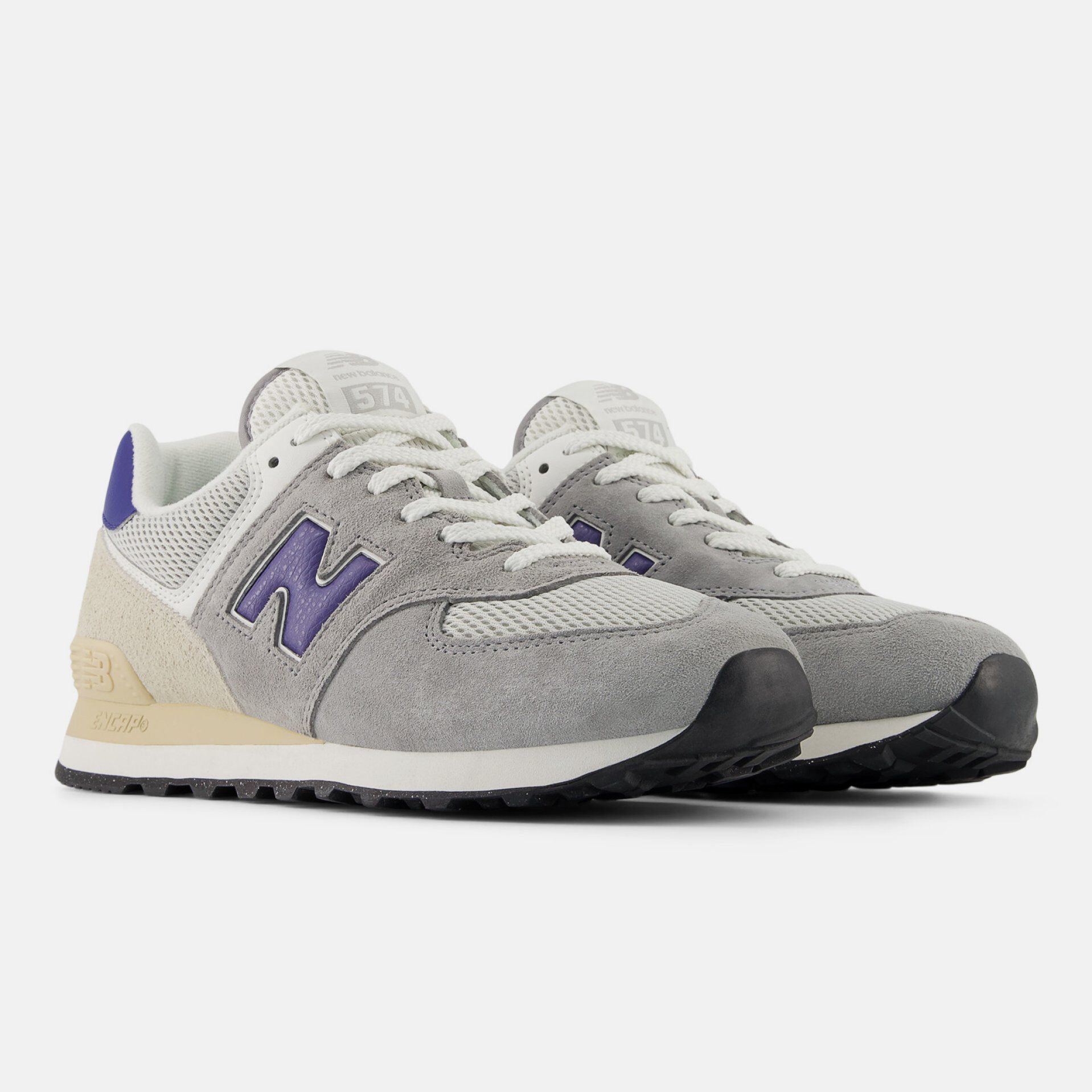 Unisex 574 in color grey.