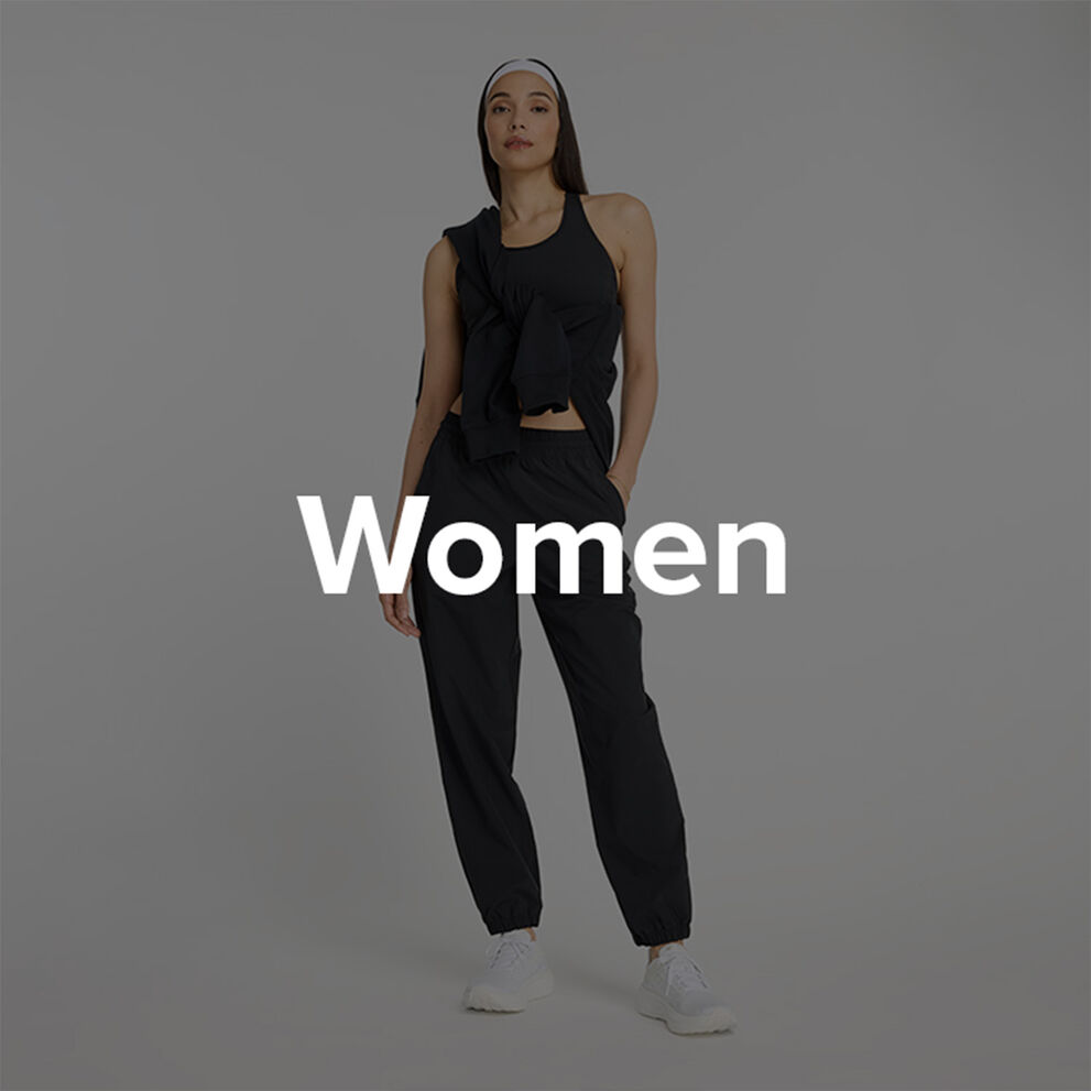 Woman in New Balance black clothes.