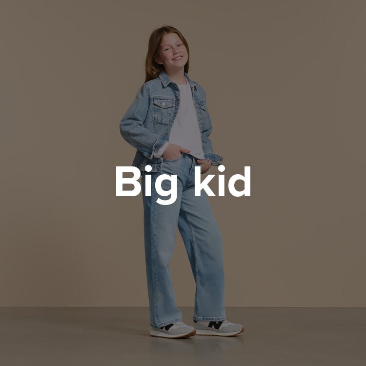 Girl in New Balance shoes.